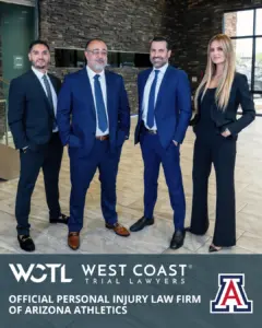 WCTL Attorneys standing in a lobby. 